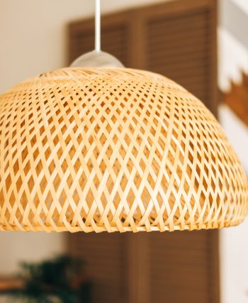 Straw lampshade in modern living room. Eco-friendly interior design using natural materials.